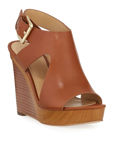 Michael Kors Josephine Wedge Sandals .